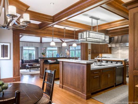 Custom kitchen with multiple islands and cherry woodwork by Fallon Custom Homes & Renovations